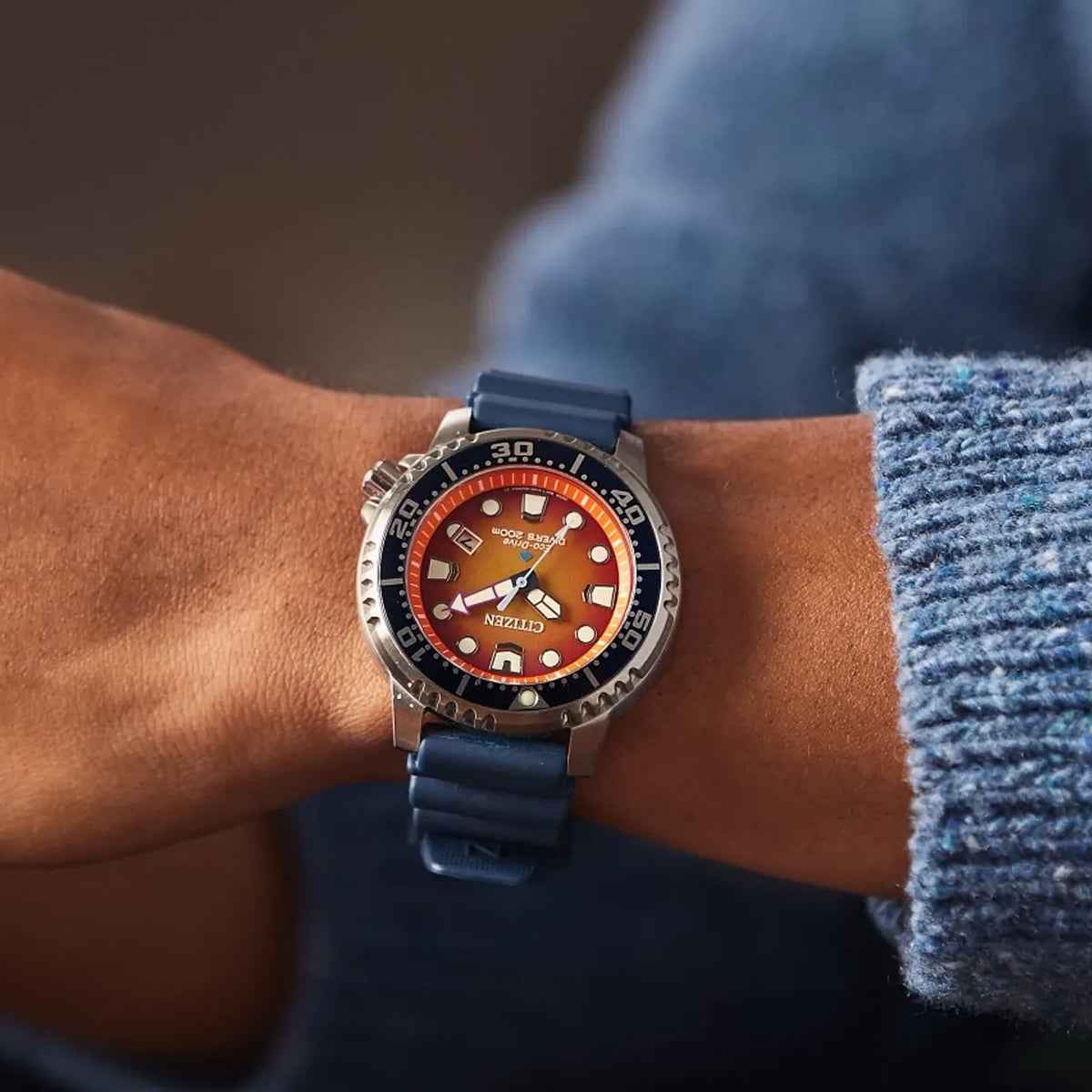 Citizen Men's Promaster Dive Eco-Drive Stainless Steel Watch with Orange Dial & Blue Polyurethane Strap close-up detail