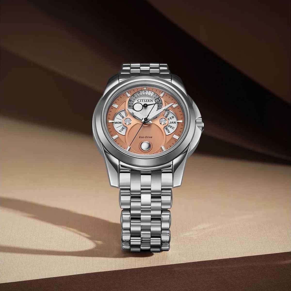 Citizen Men's Calendrier Eco-Drive Stainless Steel Watch with Salmon Dial close-up detail