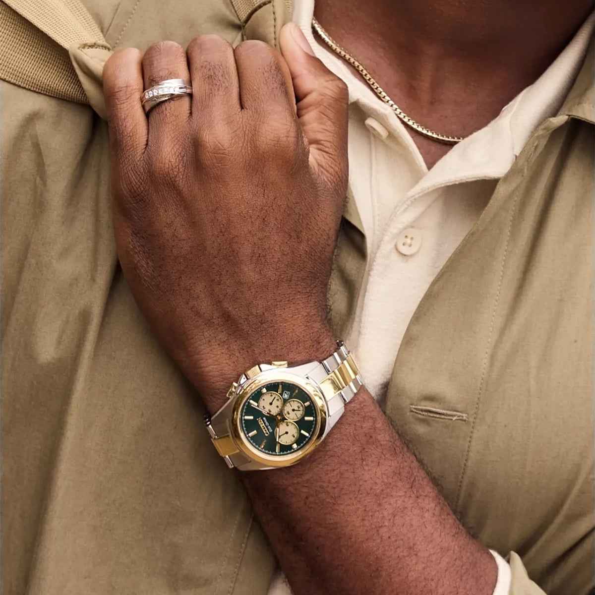 Citizen Men's Sport Luxury Eco-Drive Two-Tone Stainless Steel Watch with Green Dial close-up detail