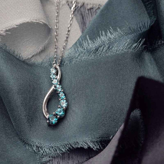 Journey Collection Blue Topaz 8 Stone Fashion Pendant in Sterling Silver front view