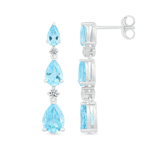 Pear Swiss Blue Topaz & 1/10 ct. tw. Diamond Graduated 3-Stone Drop Earrings in 10K White Gold close-up detail