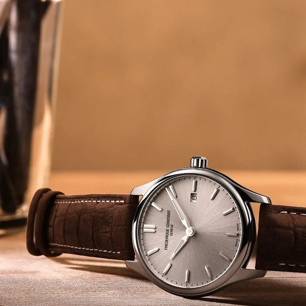 Frederique Constant Men's Quartz Stainless Steel Watch with Silver Dial & Brown Leather Strap close-up detail