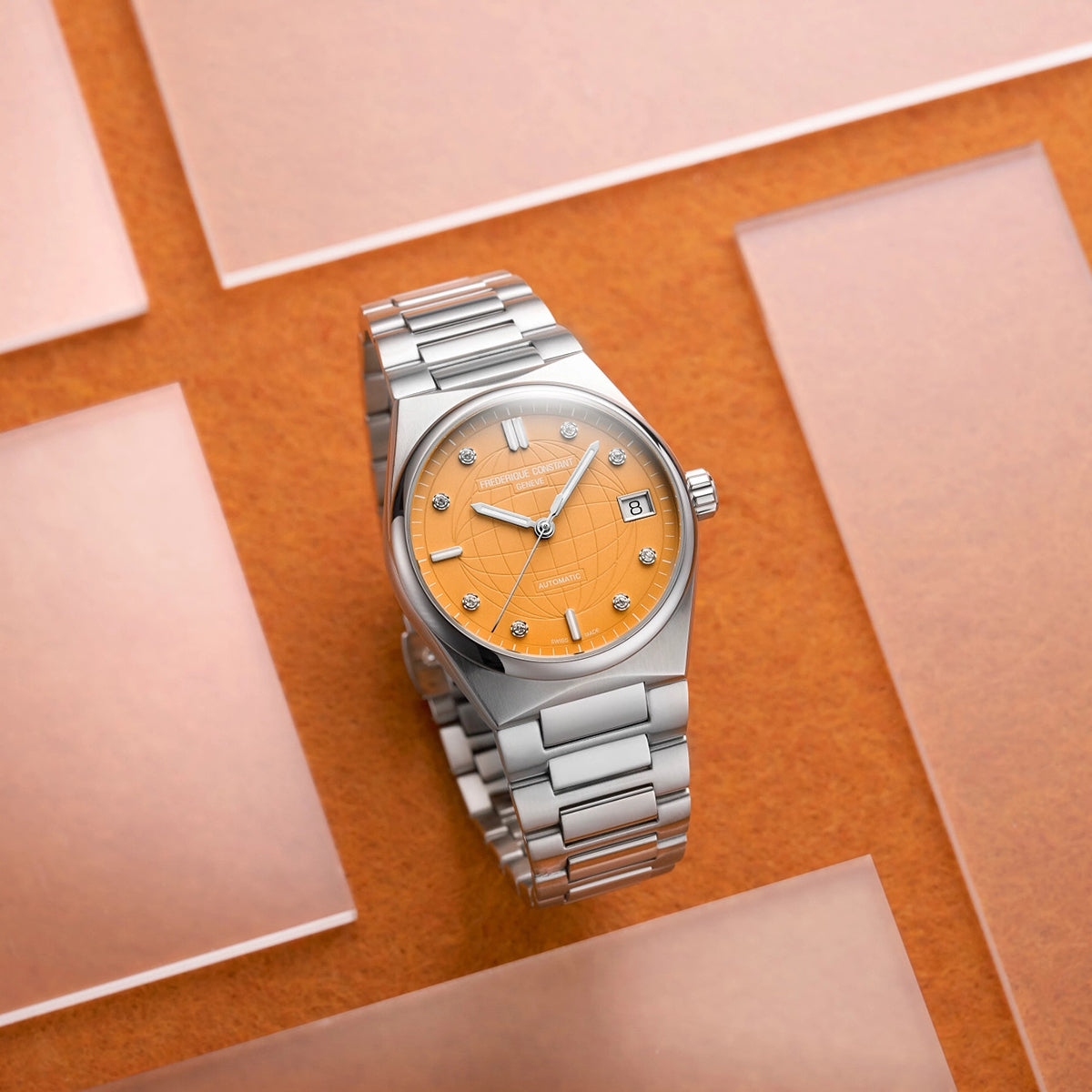 Frederique Constant Ladies' Automatic Stainless Steel Watch with Orange Dial close-up detail
