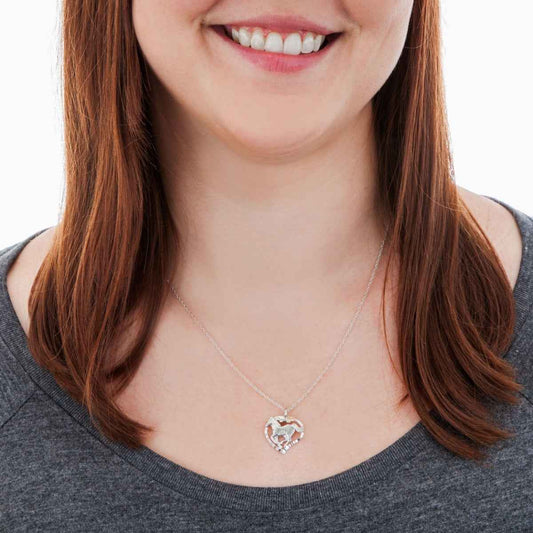 Black Hills Gold Double Leaf Running Horse Heart Pendant in Sterling Silver front view