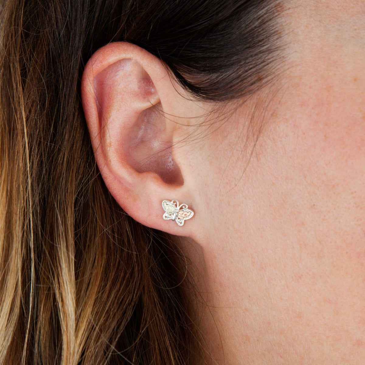 Black Hills Gold Small Butterfly Earrings in Sterling Silver close-up detail
