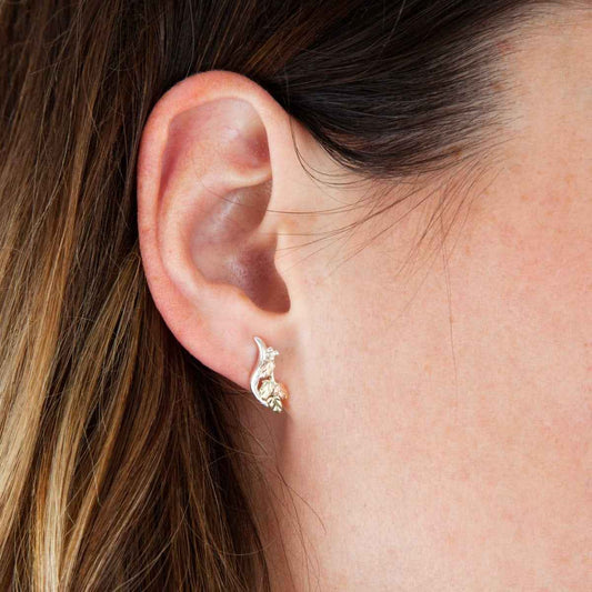 Black Hills Gold Curved Leaf Earrings in Sterling Silver front view