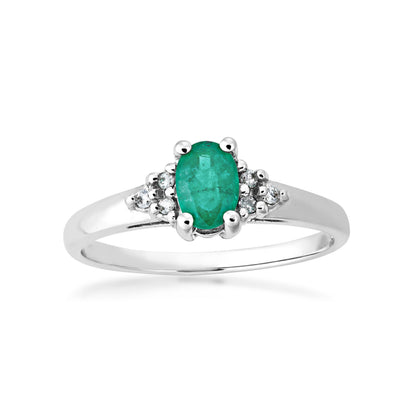Genuine Oval Shaped Emerald and .05 ct. tw. Diamond Ring in 10K White Gold