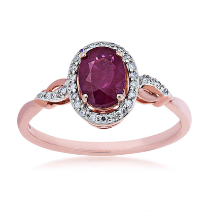 Genuine Oval Ruby & 1/8 ct. tw. Diamond Halo Ring with Mini Twist Accented Band in 10K Pink Gold