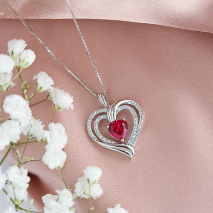 Created Heart-Shaped Ruby and White Sapphire Double-Heart Pendant in Sterling Silver front view