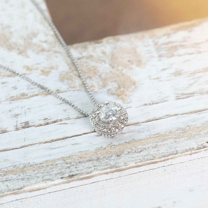 1-1/2 ct. tw. Round Brilliant Diamond Halo Pendant in 10K White Gold side profile