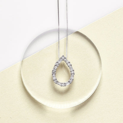 1/4 ct. tw. Round & Baguette Diamond Pear-Shaped Pendant in 10K White Gold close-up detail