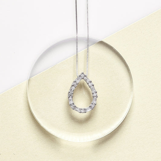 1/4 ct. tw. Round & Baguette Diamond Pear-Shaped Pendant in 10K White Gold close-up detail