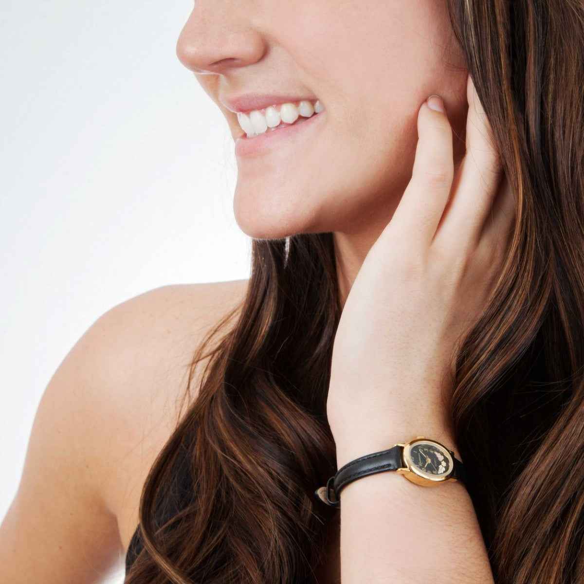 Rushmore Ladies' Black Hills Gold Gold-Tone Stainless Steel Watch with Black Dial & Black Leather Band close-up detail