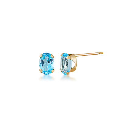 Blue Oval Topaz Pendant and Earring Set in 10K Yellow Gold close-up detail