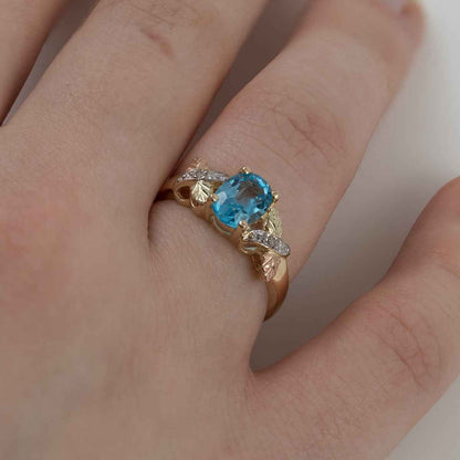 Black Hills Gold Oval Blue Topaz & Diamond Accent Ring in 10K Yellow Gold side profile
