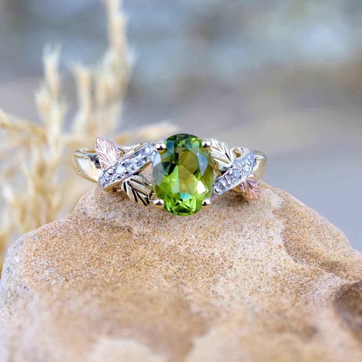 Black Hills Gold Oval Peridot & Diamond Accent Ring in 10K Yellow Gold close-up detail
