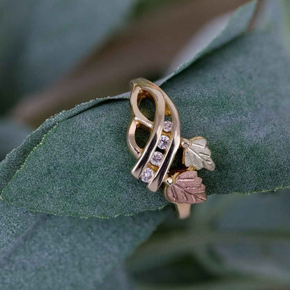 Black Hills Gold 1/10 ct. tw. Round Diamond Channel Set Leaf & Vine Ring in 10K Yellow Gold close-up detail
