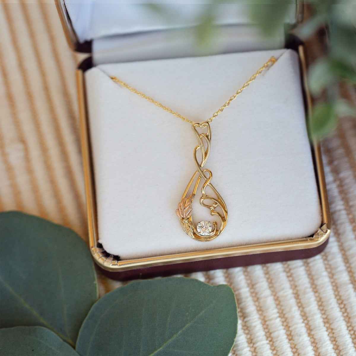 Noventa & Black Hills Gold 1/4 ct. tw. Round Diamond Vine & Leaf Teardrop Pendant in 10K Yellow Gold front view