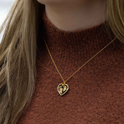 Black Hills Gold Onyx Heart Pendant with Grapevine & Leaf Accent in 10K Yellow Gold close-up detail