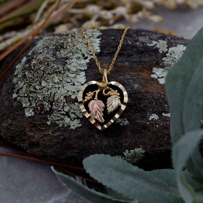 Black Hills Gold Onyx Heart Pendant with Grapevine & Leaf Accent in 10K Yellow Gold front view