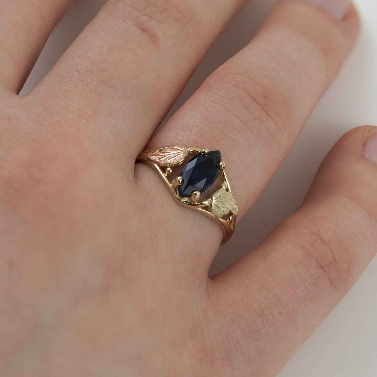 Black Hills Gold Created Marquise Sapphire Open Double Leaf Ring in 10K Yellow Gold full view