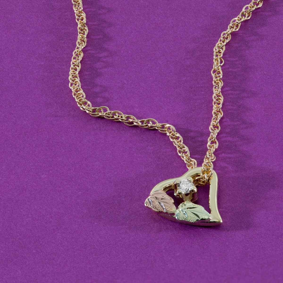 Black Hills Gold Diamond Accent Double Leaf Heart Pendant in 10K Yellow Gold front view