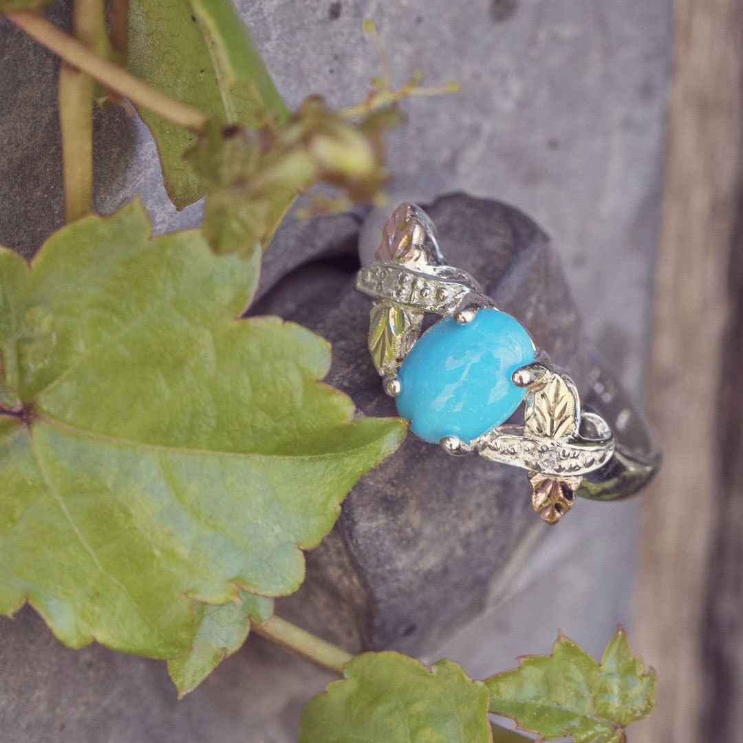 Black Hills Gold Oval Turquoise & Diamond Accent Ring in Sterling Silver close-up detail