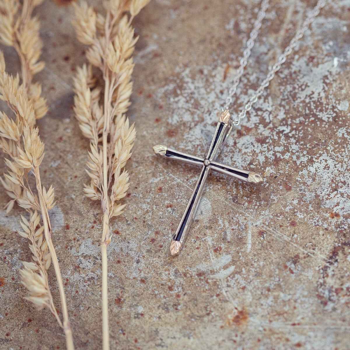 Black Hills Gold Antiqued Cross & Leaf Pendant in Sterling Silver front view