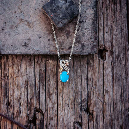 Black Hills Gold Oval Turquoise & Diamond Accent Pendant in Sterling Silver front view