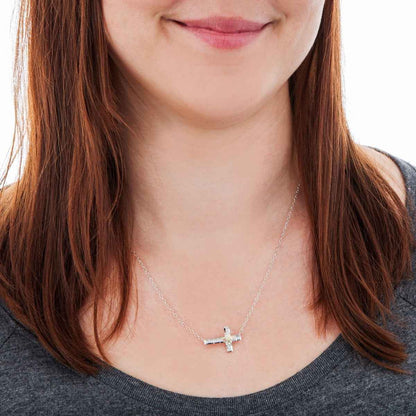 Black Hills Gold Diamond Cut Sideways Stamped Cross Pendant in Sterling Silver front view
