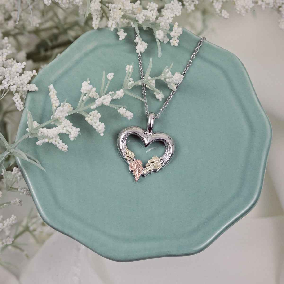 Black Hills Gold Textured Heart & Leaf Pendant in Sterling Silver front view