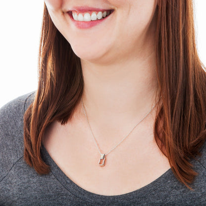 Black Hills Gold Saddle Stirrup Pendant in Sterling Silver front view