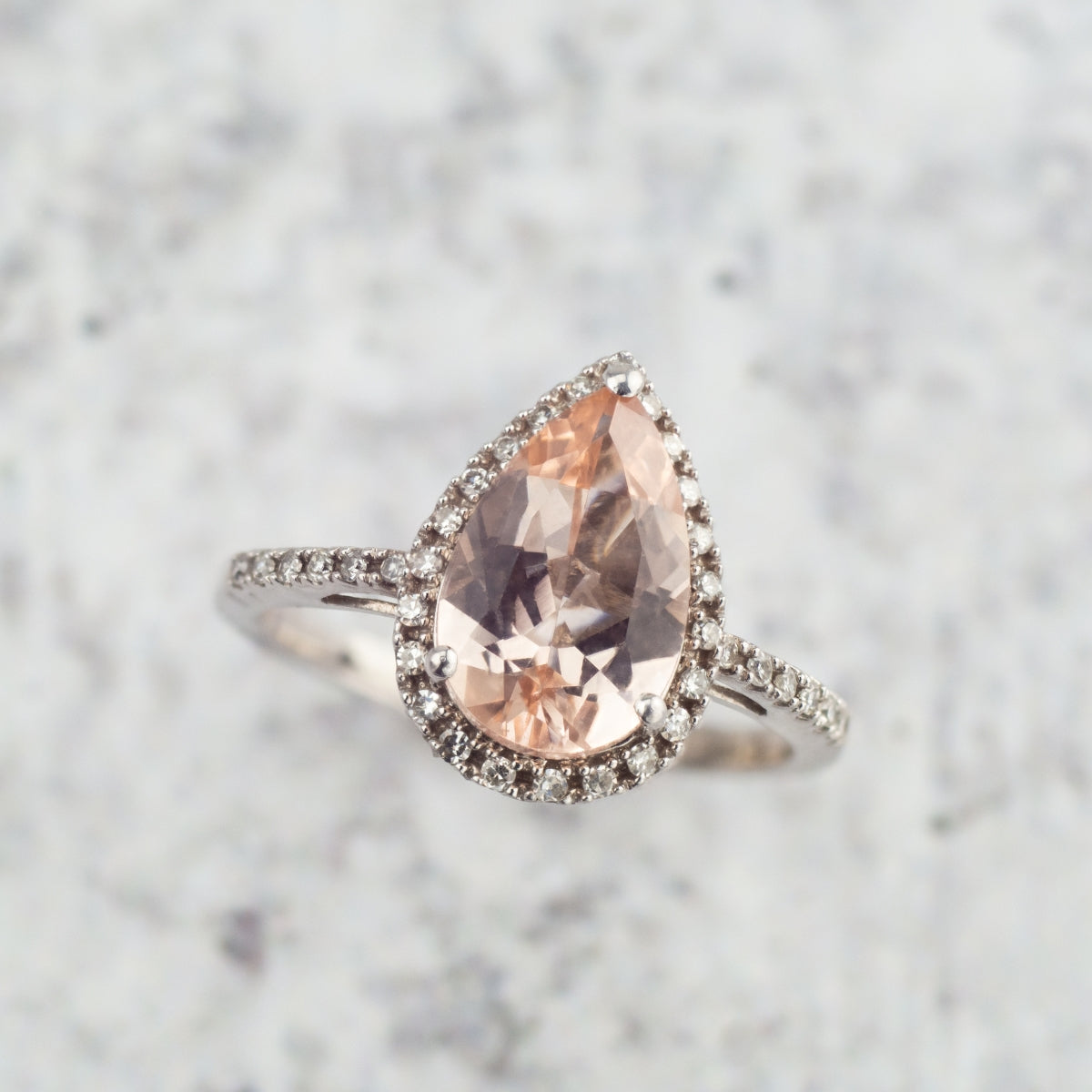 Impulse Collection Genuine Pear Shaped Pink Morganite & 1/7 ct. tw. Diamond Halo Ring in 10K White Gold side profile