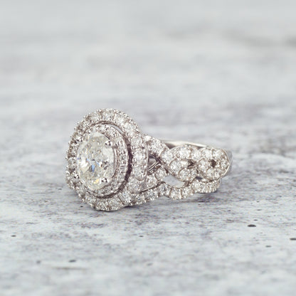 Amaura Collection 2-1/4 ct. tw. Oval Diamond Halo Wedding Set with Twist Band in 14K White Gold full view