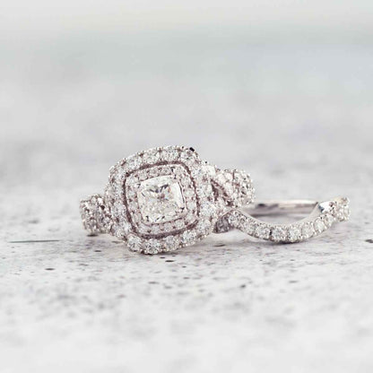 Natural 2-1/2 ct. tw. Cushion Diamond Double Halo Twist Wedding Set in 14K White Gold side profile