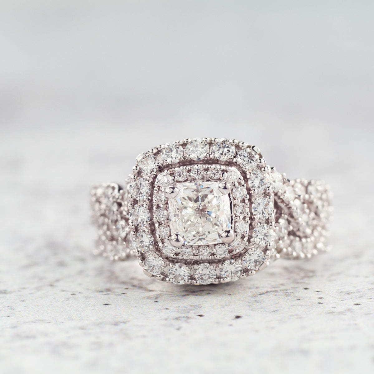 Natural 2-1/2 ct. tw. Cushion Diamond Double Halo Twist Wedding Set in 14K White Gold full view