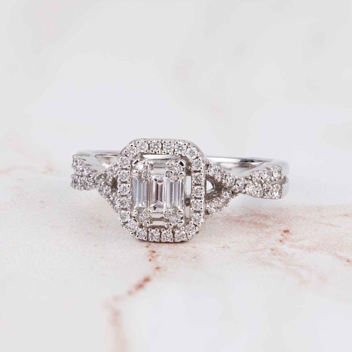 Fairytale Diamonds 5/8 ct. tw. Baguette & Round Diamond Emerald-Shaped Cluster Halo Engagement Ring with Twist side profile