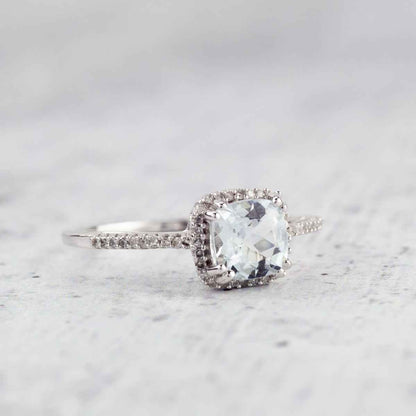 Genuine Cushion Cut Aquamarine & 1/10 ct. tw. Round Diamond Halo Ring in 10K White Gold close-up detail