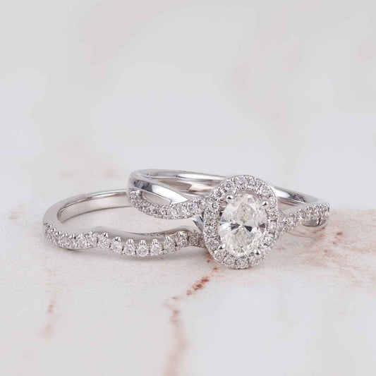 Canadian Rocks 5/6 ct. tw. Oval Diamond Halo Wedding Set with Twisted Designed Band in 14K White Gold side profile