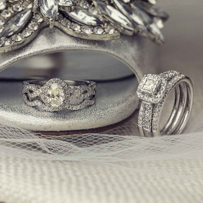 Natural 1 ct. tw. Oval Diamond Halo Twist Wedding Set in 14K White Gold side profile