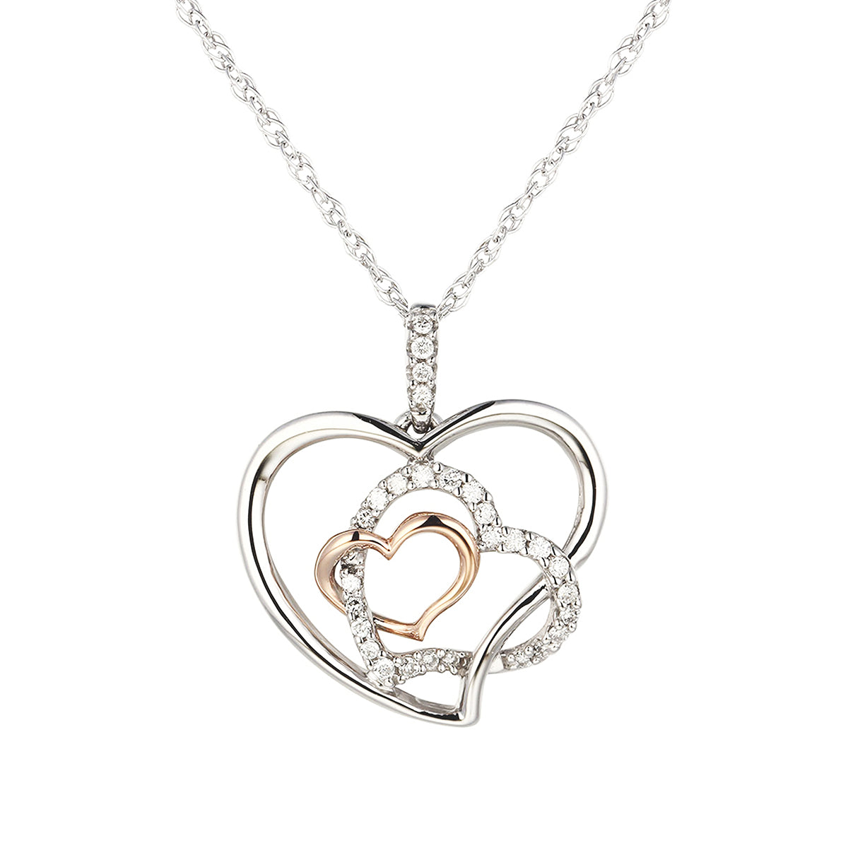A silver-toned heart-shaped pendant necklace with a smaller pink gold heart in the center, surrounded by another heart of white diamonds.