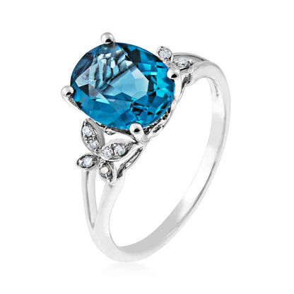 Impulse Collection Oval London Blue Topaz & Diamond Accent Floral Split Shank Ring in 14K White Gold front view