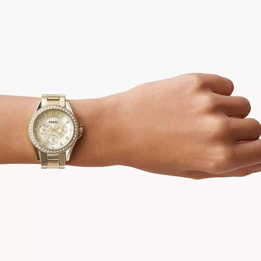 Fossil Ladies' Riley Quartz Multi-Function Gold-Tone Stainless Steel Watch with Crystal Accent Champagne Dial front view