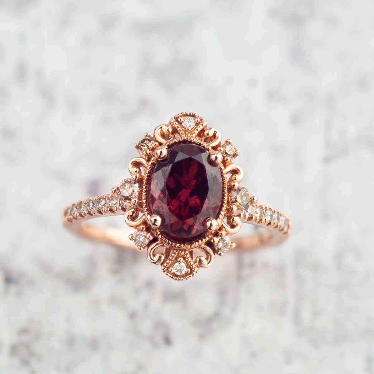 Impulse Collection Genuine Oval Garnet Engagement Ring with 1/4 ct. tw. Mocha & White Diamond Filigree & Milgrain full view