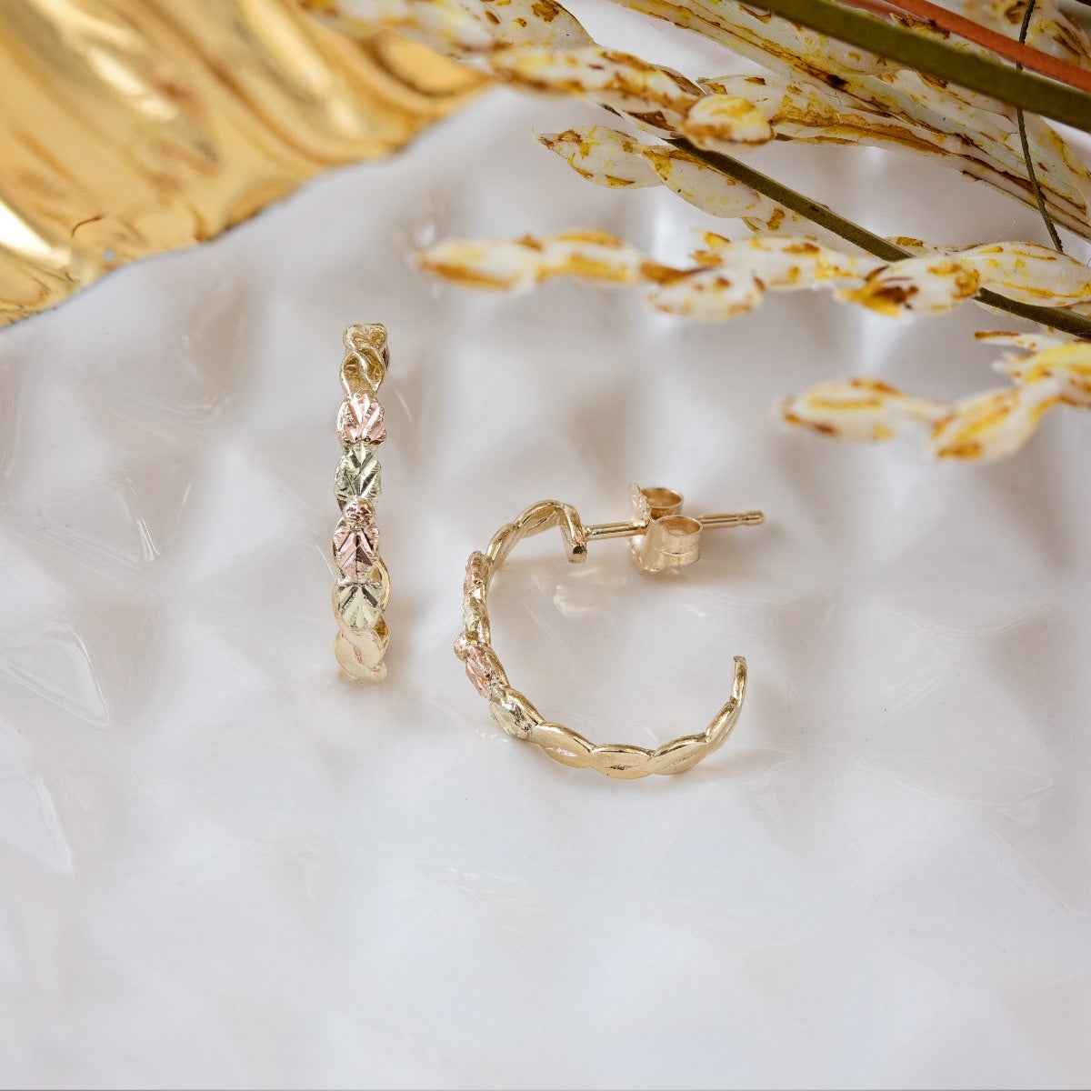 Black Hills Gold Pink & Green Leaf Twist J Hoop Earrings in 10K Yellow Gold front view