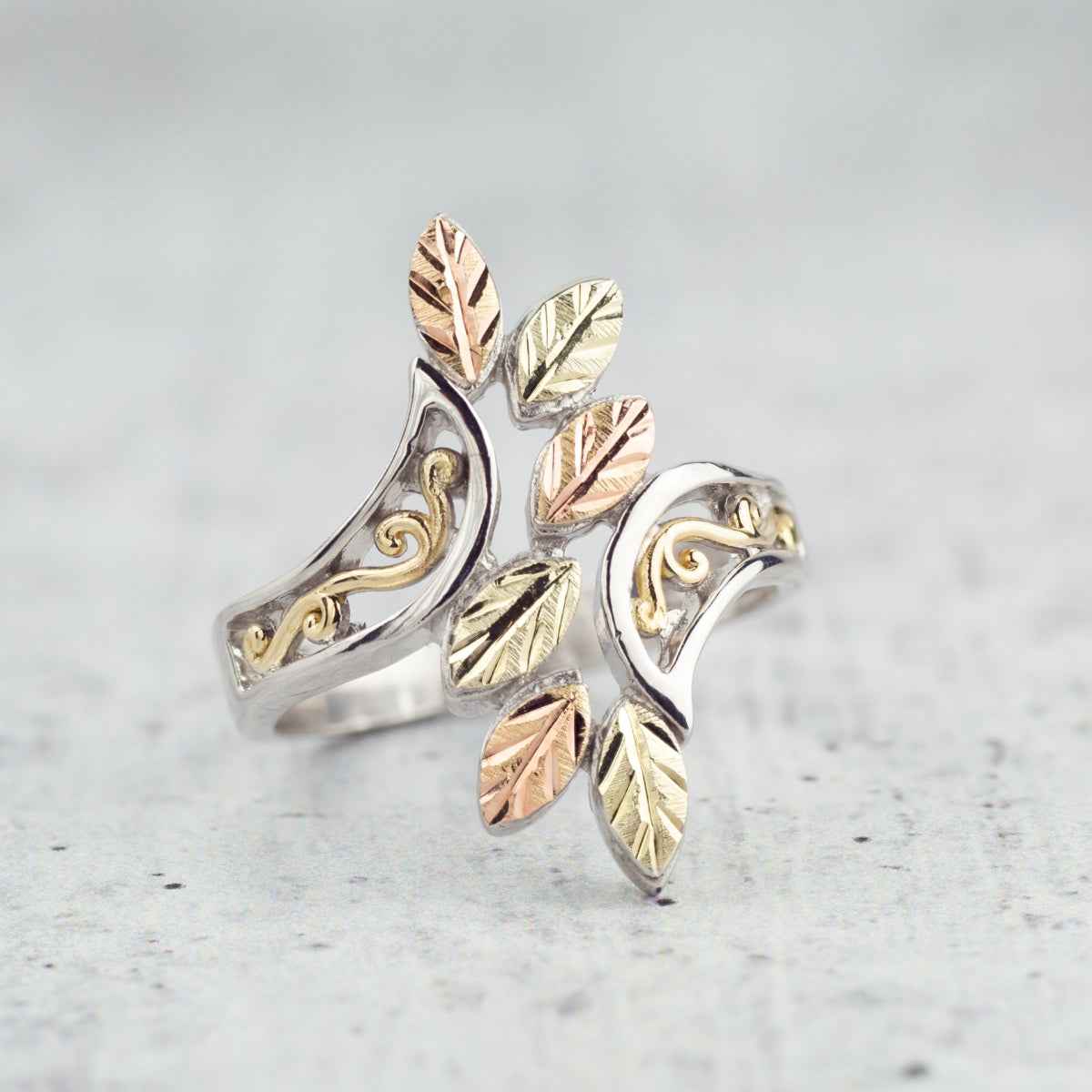 Black Hills Gold Leaf & Filigree Bypass Ring in Sterling Silver & 10K Yellow Gold close-up detail