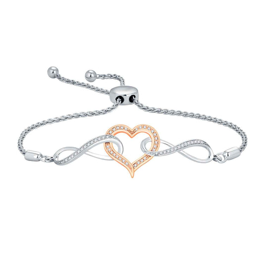 1/6 ct. tw. Diamond Heart Bolo Bracelet with Infinity Accents in Two-Tone Sterling Silver