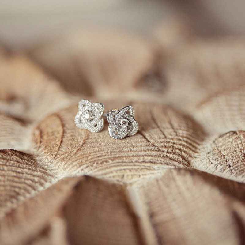 Love Knot 1/3 ct. tw. Diamond Classic Knot Fashion Earrings in 10K White Gold front view