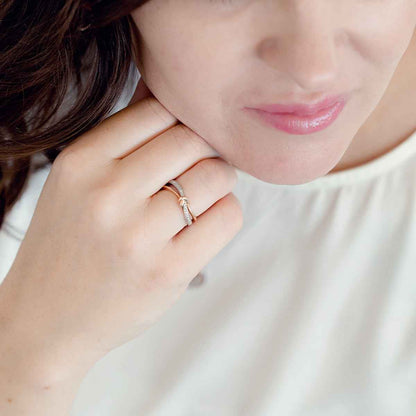 1/10 ct. tw. Diamond Ring with Knot Design in 10K White and Pink Gold close-up detail
