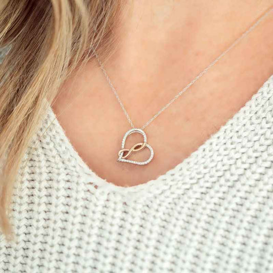 Infinite Love 1/10 ct. tw. Diamond Heart Infinity Pendant in Sterling Silver and 10K Pink Gold front view
